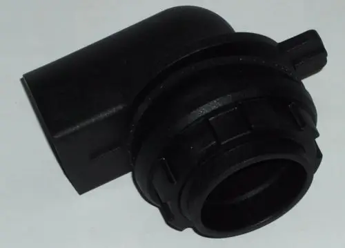 Black plastic connector with a rounded design, typically used in heating systems, likely part of a Daikin product line for efficient installation.